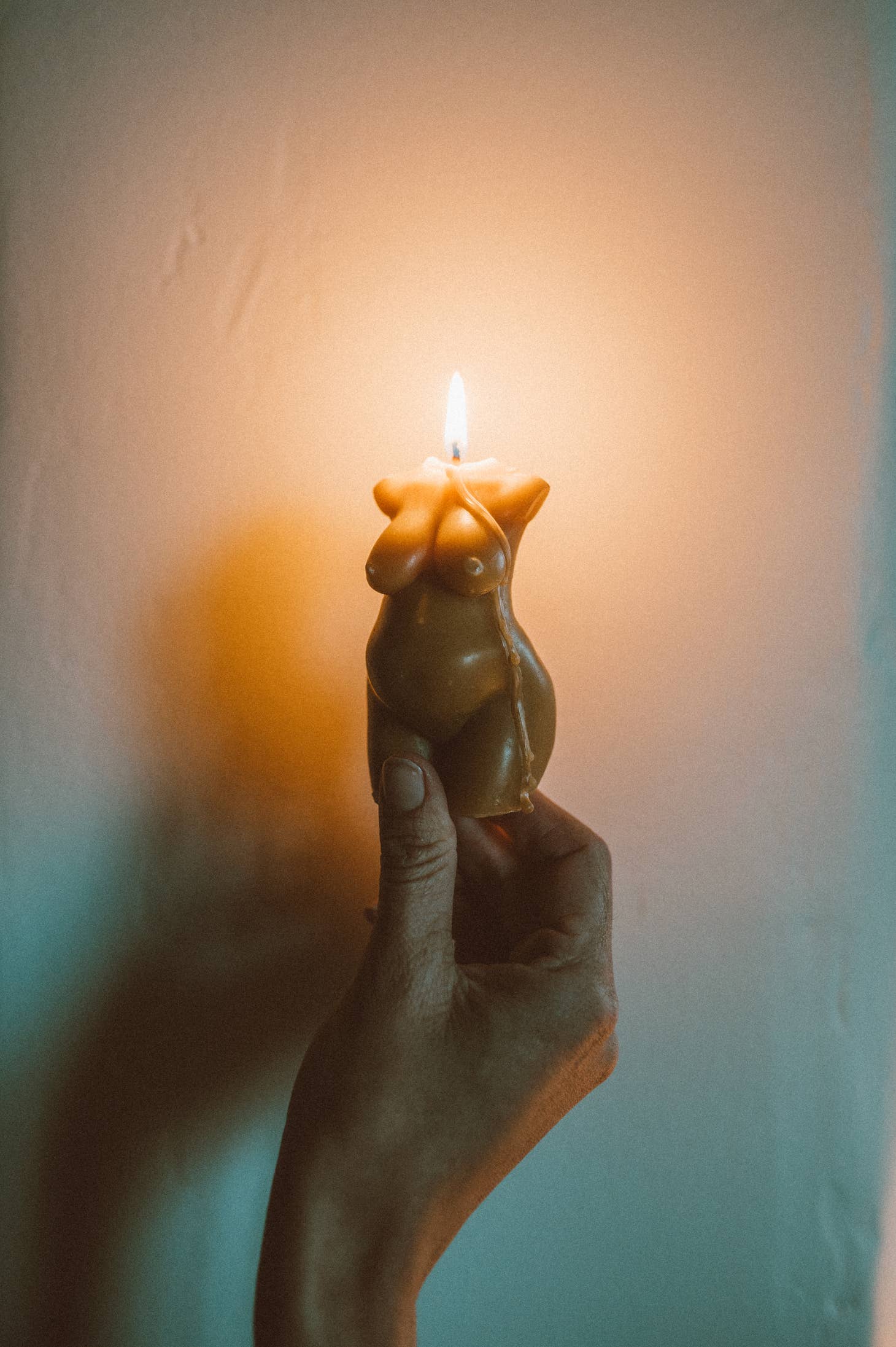 Burning pregnant body candle