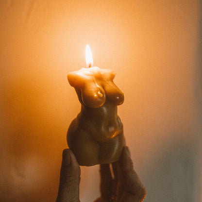 Female body candle burning